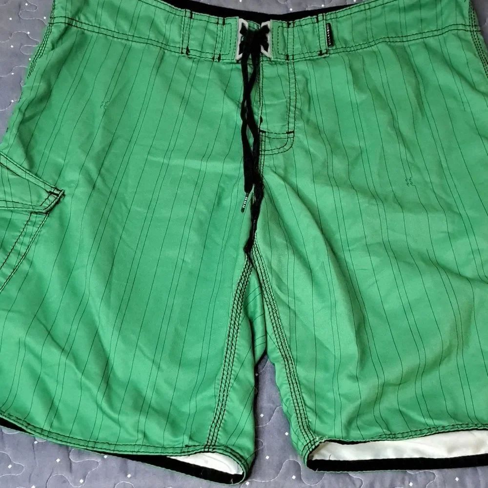 Billabong green board shorts size 38